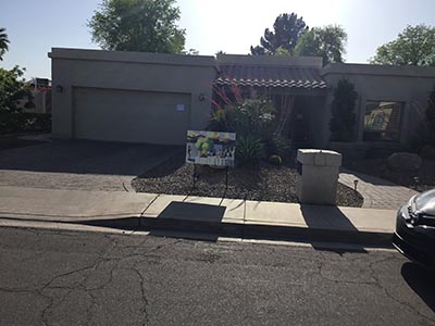 exterior of home, with potluck sign