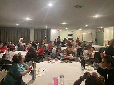 people at potluck dinner