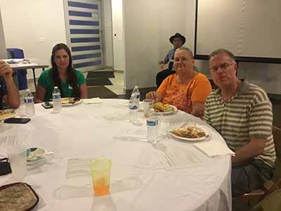 people at potluck dinner