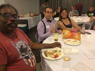 people at potluck dinner