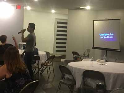 Sam singing karaoke