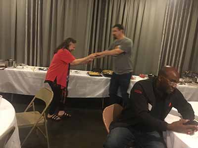 Kathleen and Dominik dancing at potluck dinner party