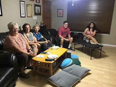 people sitting in living room