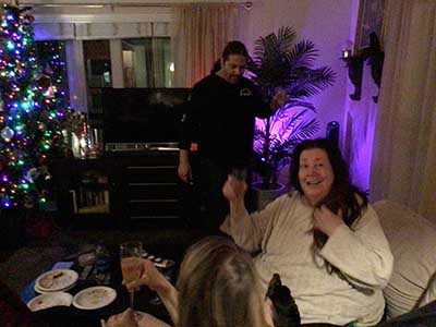 people toasting the new year at New Years Eve party