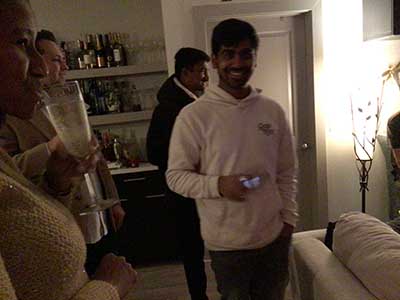 people toasting the new year at New Years Eve party