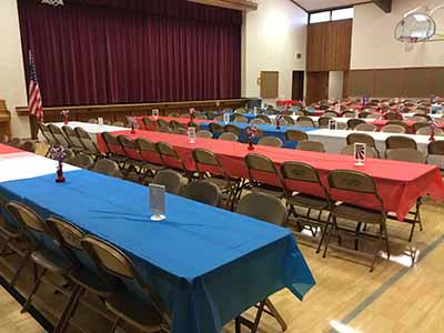 4th of July Potluck Lunch tables with flag