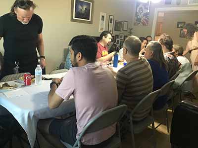 people at potluck dinner