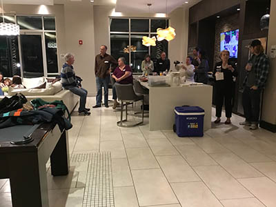 people at potluck dinner