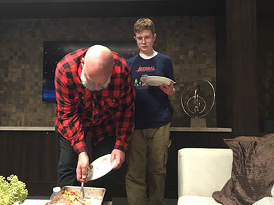 Phil serving everything bagels casserole