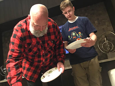 Phil serving everything bagels casserole