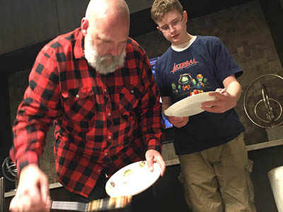 Phil serving everything bagels casserole