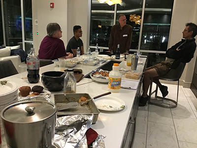 people at potluck dinner