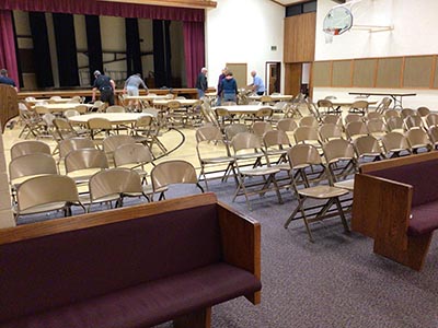people setting up for a memorial service