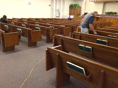 people setting up for a memorial service