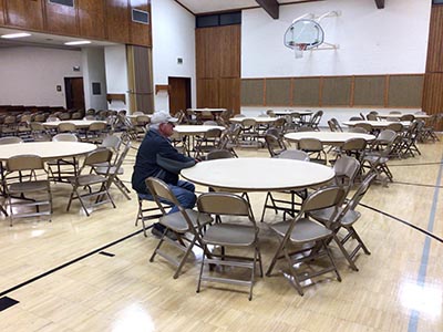 people setting up for a memorial service