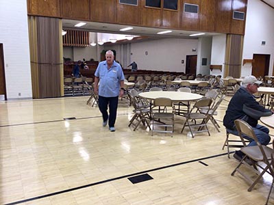 people setting up for a memorial service
