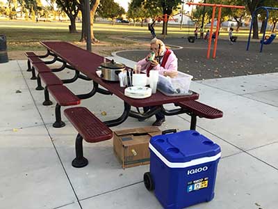 Joyce sitting at picnic table