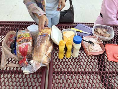 sandwich fixings with deli meats and cheese