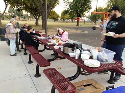 people at potluck dinner