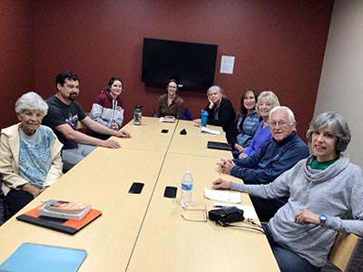 people attending book club meeting