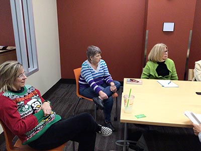 people attending book club meeting