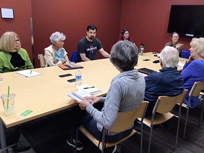 people attending book club meeting