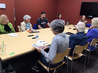 people attending book club meeting