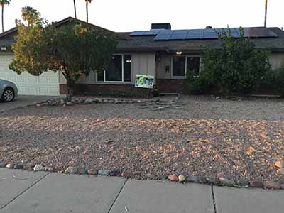 home exterior with potluck poster