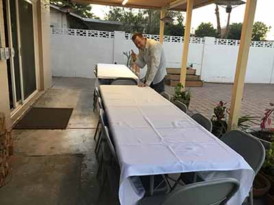 tables outside and Joseph