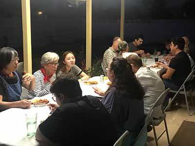 people at potluck dinner