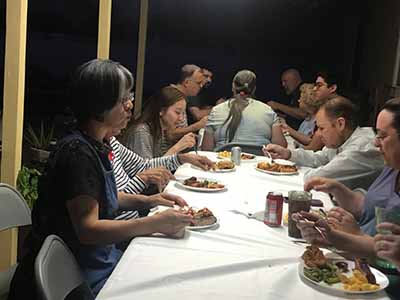 people at potluck dinner