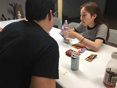 student showing guest Japanese treats