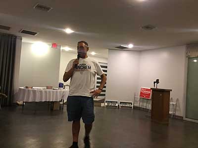 Republican candidate Mark Finchem speaking to neighbors