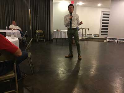 Republican candidate Caden Darrow speaking to neighbors