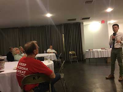 Republican candidate Caden Darrow speaking to neighbors