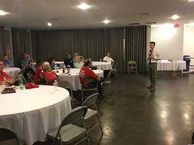 Republican candidate Caden Darrow speaking to neighbors
