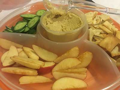 apple slices, cucumbers, pita bread, hummus