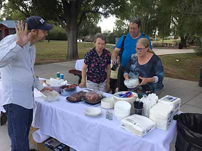 people at food serving table