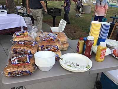 hamburger and hotdog buns and condiments