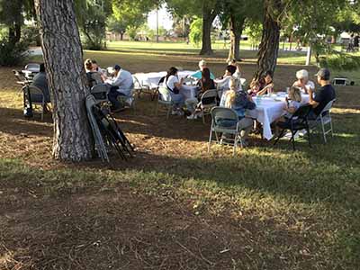 people at potluck dinner