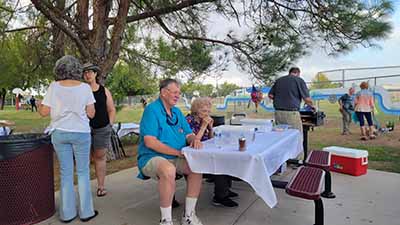 people at potluck dinner