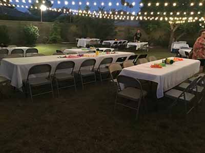tables and chairs used at birthday party luau - 28 October 2022