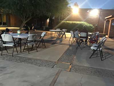 people at potluck dinner