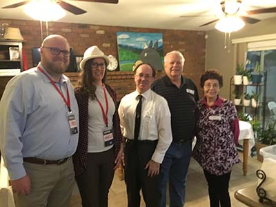 Forward Party members and host