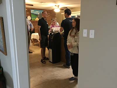 people at potluck dinner