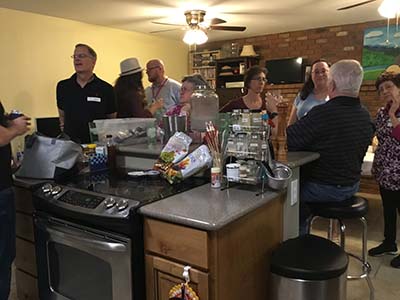 people at potluck dinner