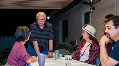 people at potluck dinner