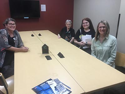 half of attendees at book club meeting
