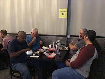 Men at Foreva Wings Guys Night Out event
