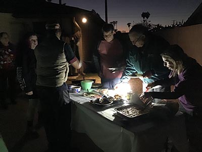 people at potluck dinner